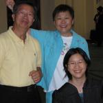 Mom does bunny ears on Dad, as usual